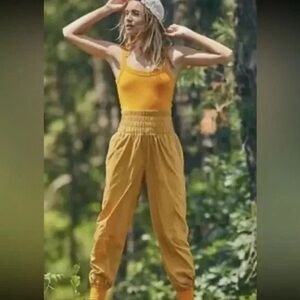 FP Movement by Free People the way home Yellow mustard Jumpsuit NWOT